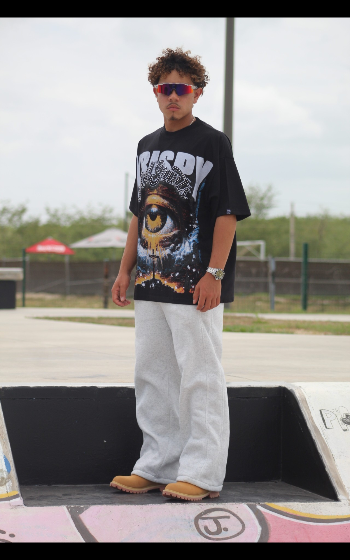"THROUGH THE EYE OF KRISPY" oversized tee