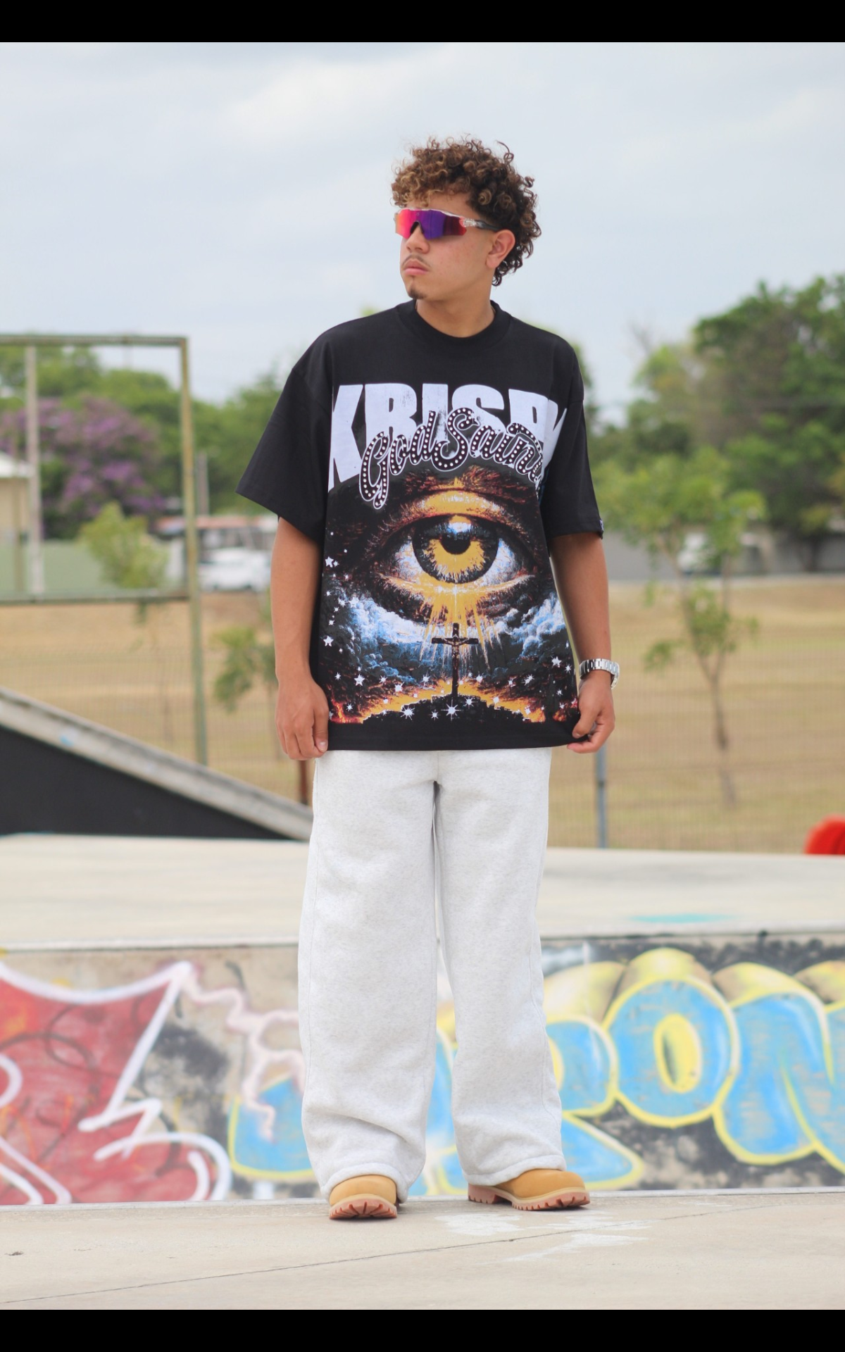 "THROUGH THE EYE OF KRISPY" oversized tee